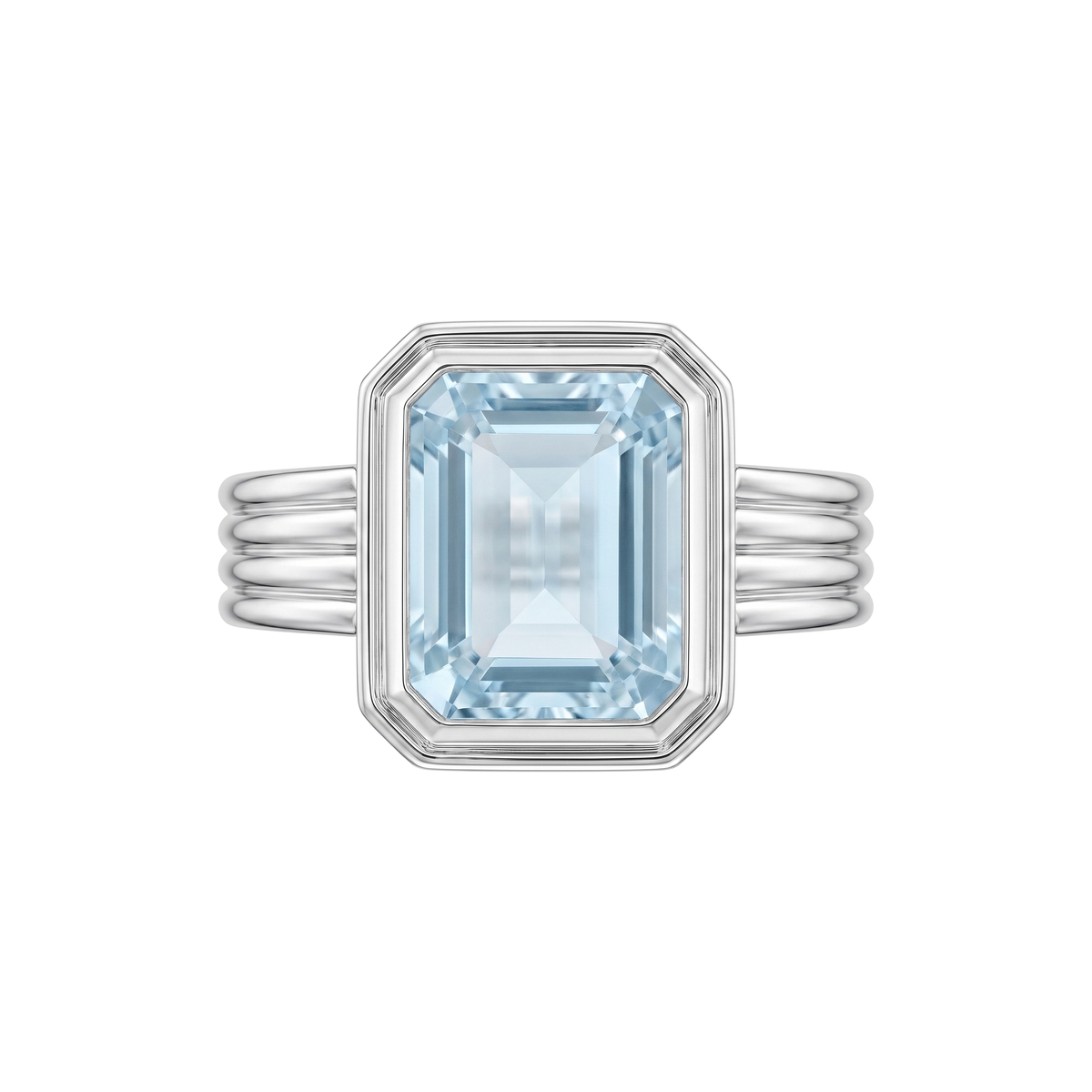 Rebecca Ring in rhodium plated 9k white gold, emerald cut blue topaz bezel set on a fluted band