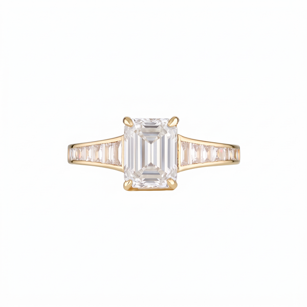 Empire Ring front on with I colour emerald cut centre diamond and I colour baguette shoulders in 18k yellow gold