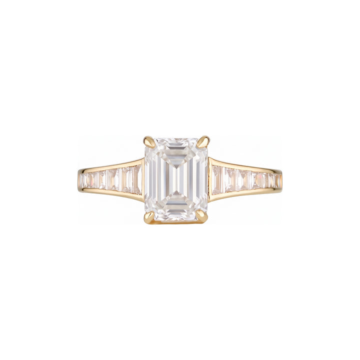 Empire Ring front on with I colour emerald cut centre diamond and I colour baguette shoulders in 18k yellow gold